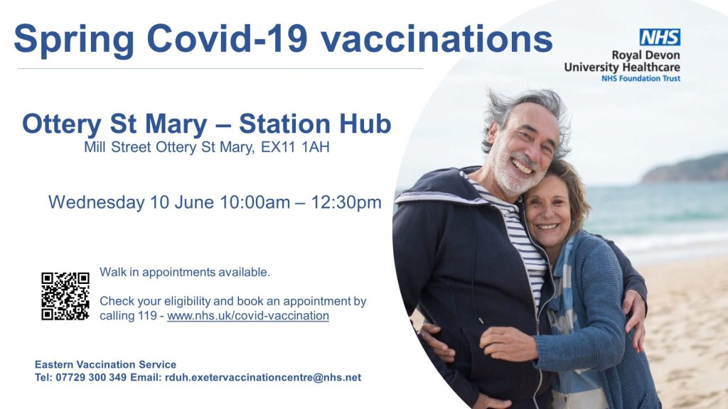 Poster advertising a Spring COVID‑19 vaccination clinic at Ottery St Mary Station Hub on Wednesday 10 June from 10:00am to 12:30pm, with NHS branding and a photo of two adults standing together on a beach.