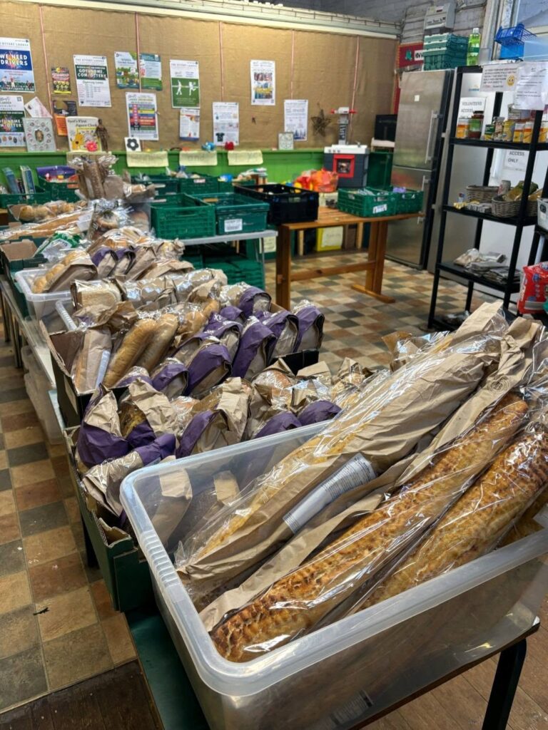 Bread and food supplies displayed.